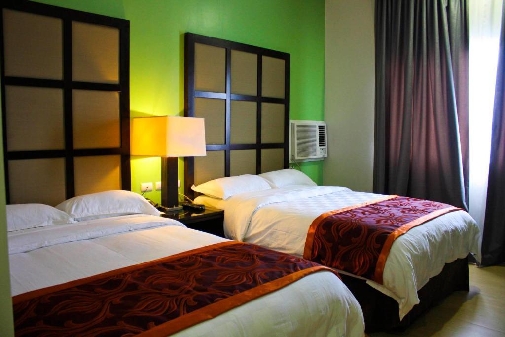Avenue Suites Hotel And Spa Bacolod Zimmer foto